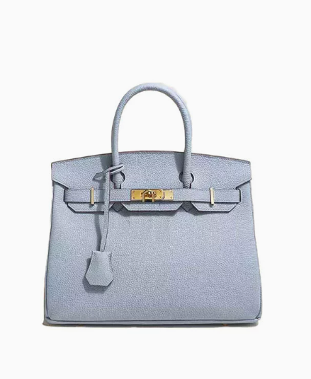 Platinum women's bag made from first layer cowhide leather, featuring a sleek design and high-quality craftsmanship.