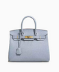 Platinum women's bag made from first layer cowhide leather, featuring a sleek design and high-quality craftsmanship.