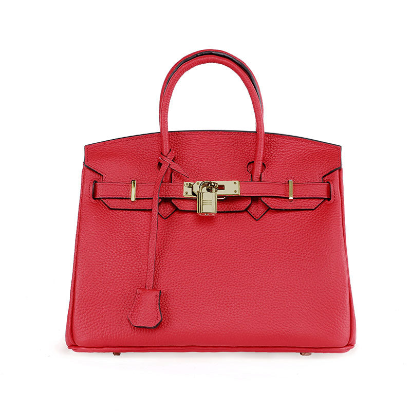 Platinum women's bag made from first layer cowhide leather, featuring a sleek design and high-quality craftsmanship.