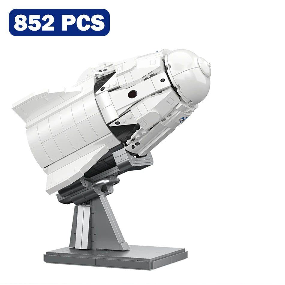 BackUpMyFilesNow.com SpaceX Dragon 2 spacecraft model building blocks, 852-piece set with spaceship cargo and educational toy design.