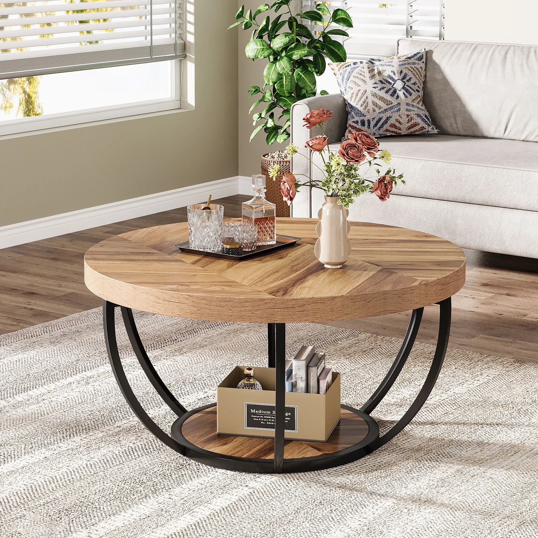 Modern wooden and black 31.7-inch round coffee table with industrial design, 2-tier storage shelves, and a stylish center accent.