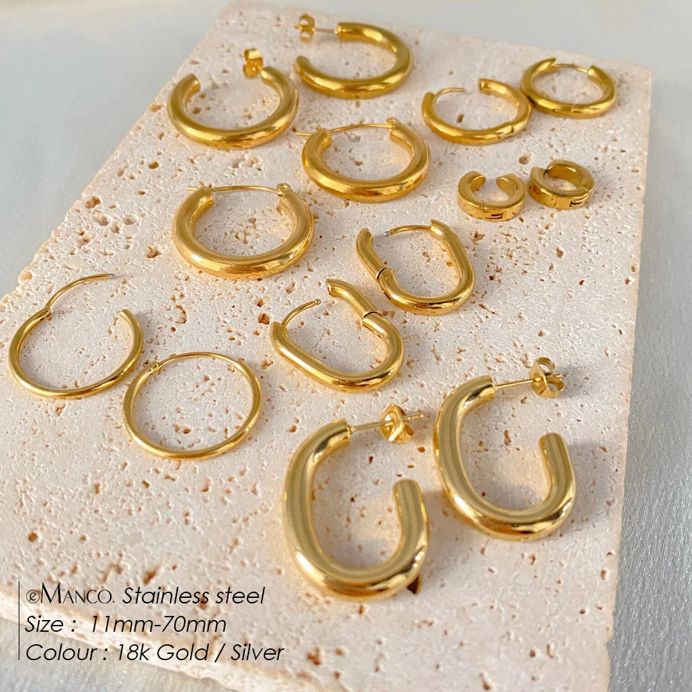 Gold-plated stainless steel large hoop earrings for women, stylish fashion jewelry accessory for Valentine's Day gifting.