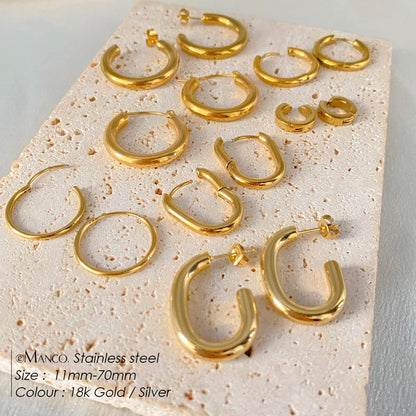 Gold-plated stainless steel large hoop earrings for women, stylish fashion jewelry accessory for Valentine's Day gifting.