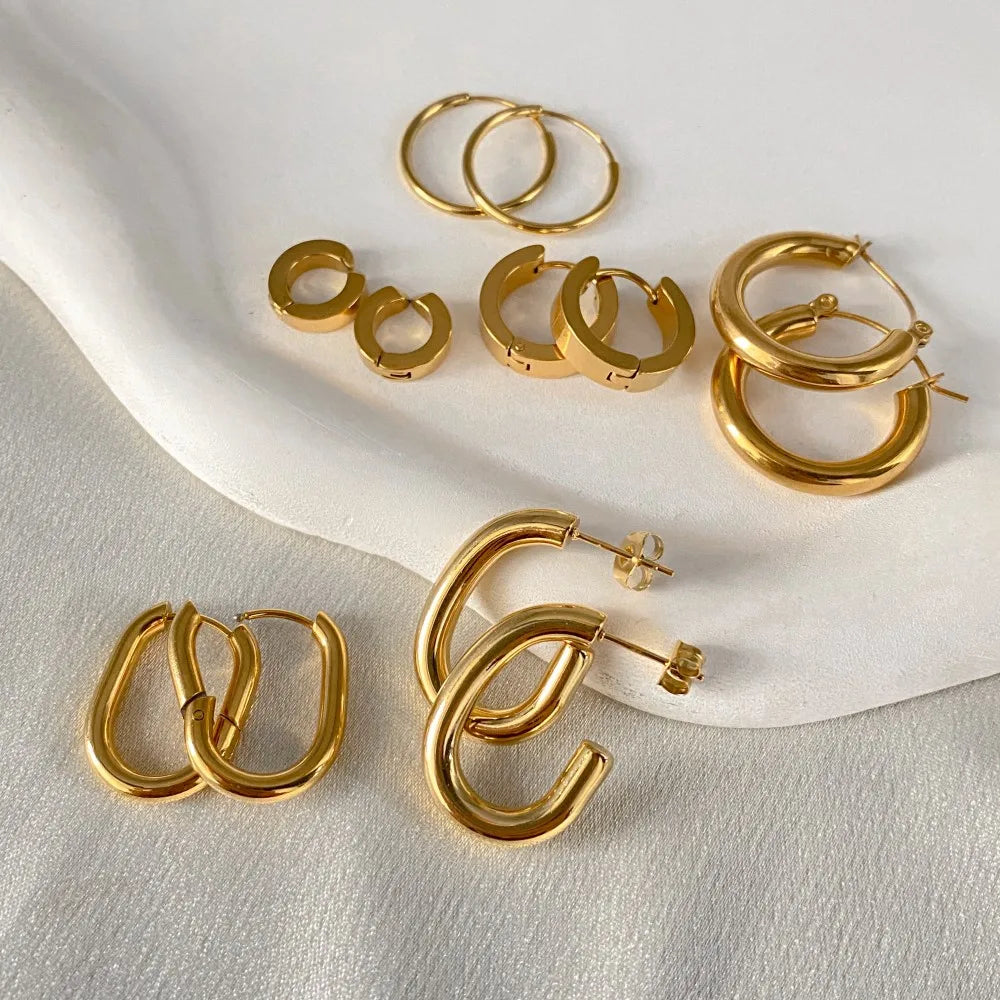 Gold-plated stainless steel large hoop earrings for women, stylish jewelry accessory perfect for Valentine's Day or everyday wear.