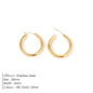 Gold-tone stainless steel large hoop earrings by eManco, fashion jewelry for women, perfect for Valentine's Day accessories