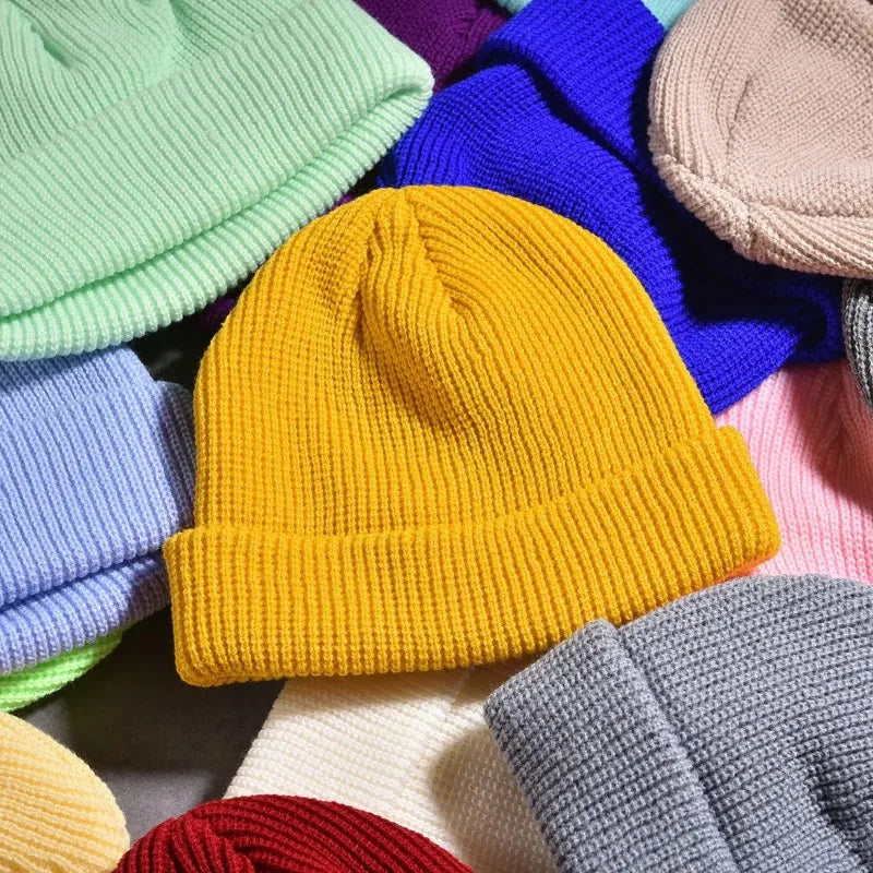 Yellow knitted beanie cap for men and women, stylish and warm wool hat perfect for autumn and winter.