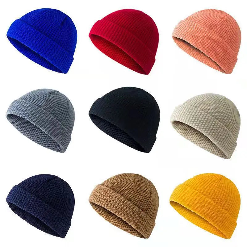 Yellow knit beanie cap for men and women, warm and stylish solid wool winter hat with simple, trendy design.