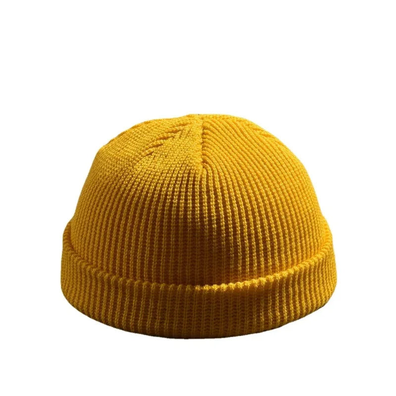Yellow solid beanie cap by BackupMyFilesNow.com, warm knitted wool hat for men and women, trendy autumn winter skullies style.