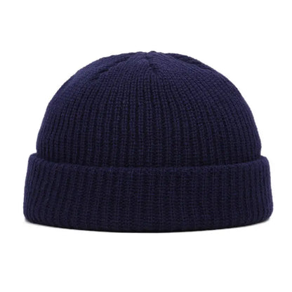 Yellow solid wool beanie cap with a simple, warm knitted design for men and women, suited for autumn and winter fashion.