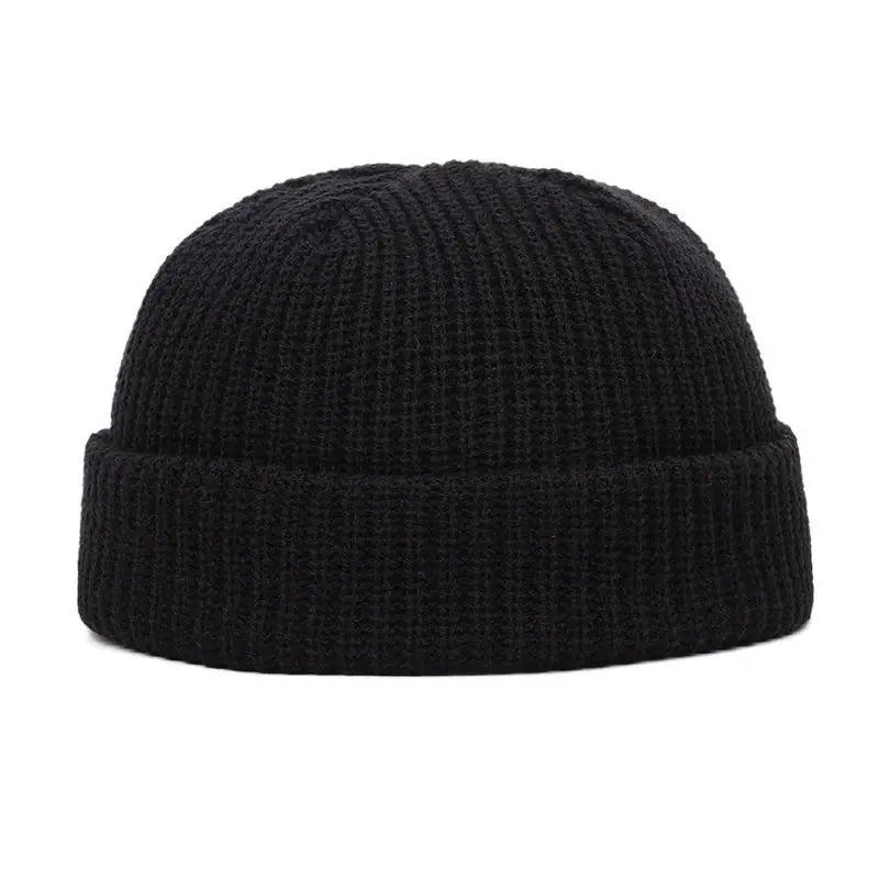 Yellow knitted beanie cap for men and women, warm and stylish solid wool skullie hat for autumn and winter fashion.