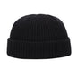 Yellow knitted beanie cap for men and women, warm and stylish solid wool skullie hat for autumn and winter fashion.