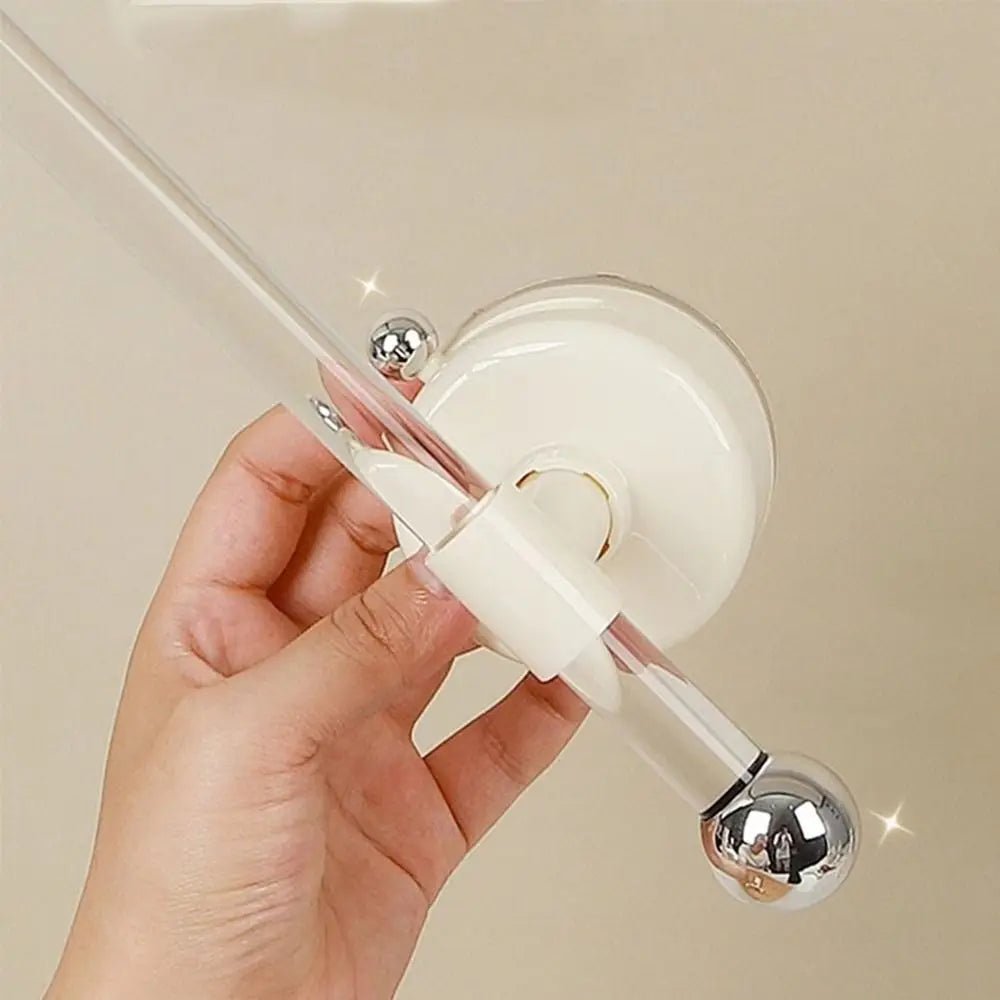 Yellow suction cup paper towel holder mounted on wall, reusable, waterproof, space-saving tissue holder with no drilling needed.