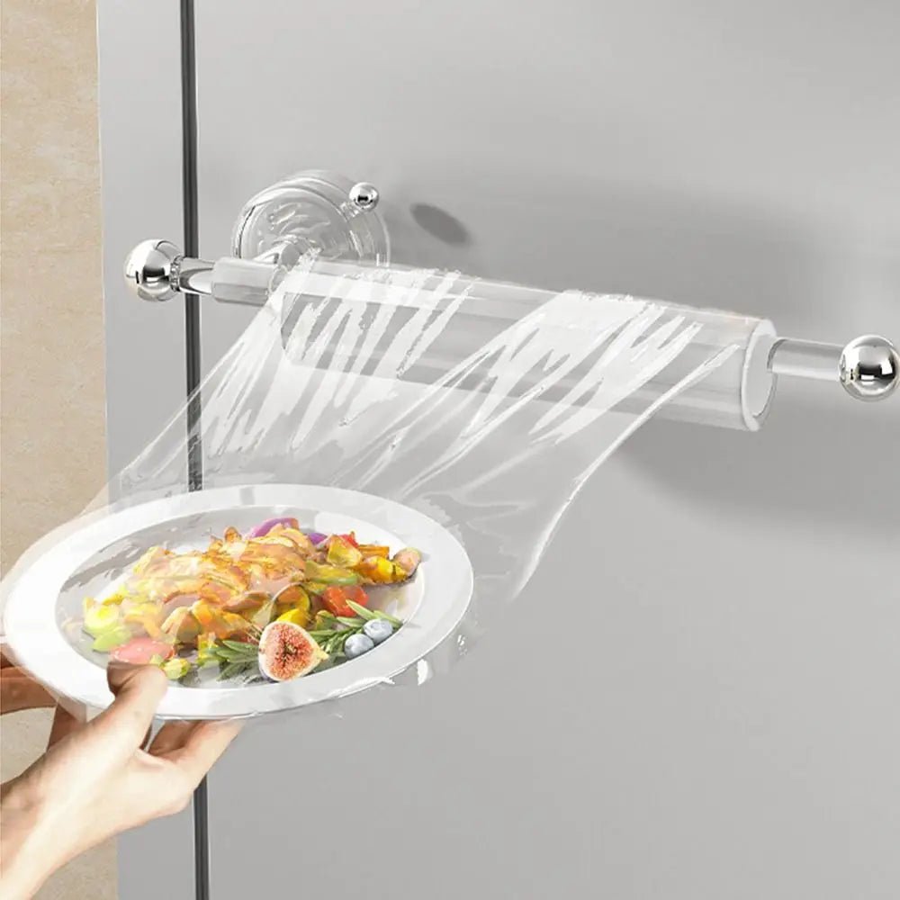 Yellow suction cup paper towel holder mounted on wall, reusable, waterproof, space-saving tissue roll holder without drilling.