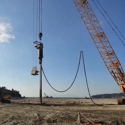 Electrical vibroflotation construction machinery by BACKUPMYFILESNOW.COM® for ground improvement and stone column installation.