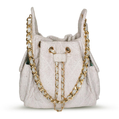 Small Bayshore Bucket in sandy grey by BEACH HAUS, shown with the bag's textured fabric and sturdy handle.