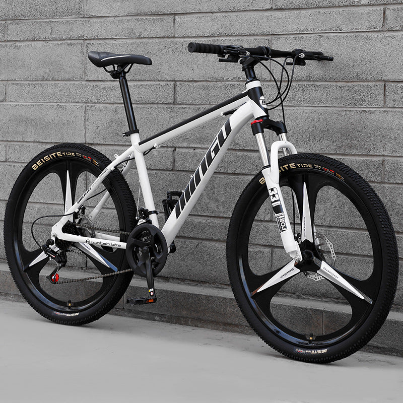 Mountain bike bicycle with disc brakes, shock absorption, and variable-speed gearing for men and women