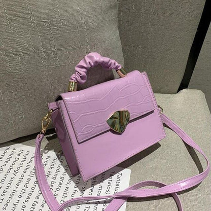 BACKUPMYFILESNOW® women's designer crossbody handbag with stone pattern, featuring a compact shape and stylish design.