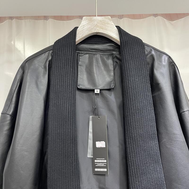 Women's mid-length knitted stitching leather coat in a sleek design