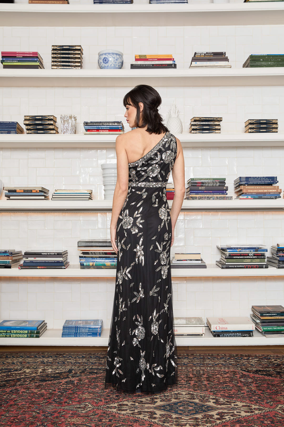 Ceylan Bcn Kamala long dress featuring flowing fabric and elegant design, displayed on a model against a neutral background.
