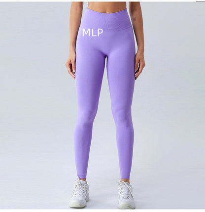 Black SculptFit leggings displayed flat, showing a high-waisted design and contoured stitching