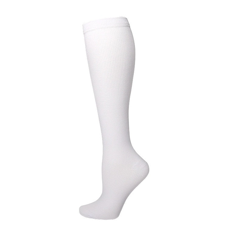 Women's calf-length compression socks in a simple design, displayed flat