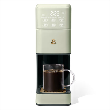 Beautiful Perfect Grind™ Sage Green Programmable Single Serve Coffee Maker by Drew Barrymore, with a sleek modern design.