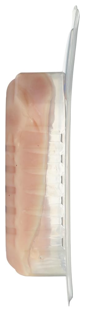Bell & Evans boneless skinless chicken breast raw meat on a white surface, ready for cooking.