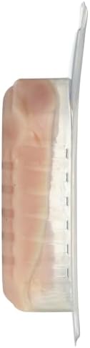 Bell & Evans boneless skinless chicken breast raw meat on a cutting board