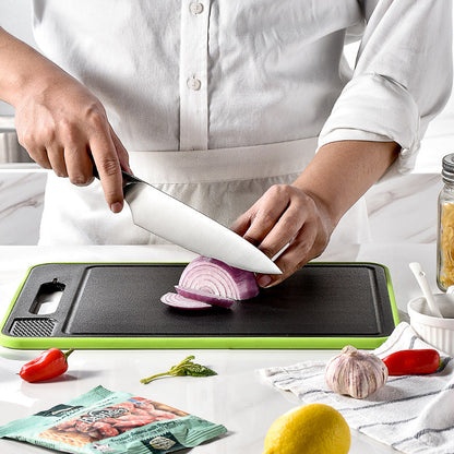 Double-sided cutting board with defrosting function, chopping surface, and built-in knife sharpener