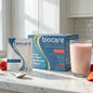 Biocare Strawberry and Cream protein dietary beverage in a 30g serving, with fresh-looking strawberries and cream swirl on the packaging