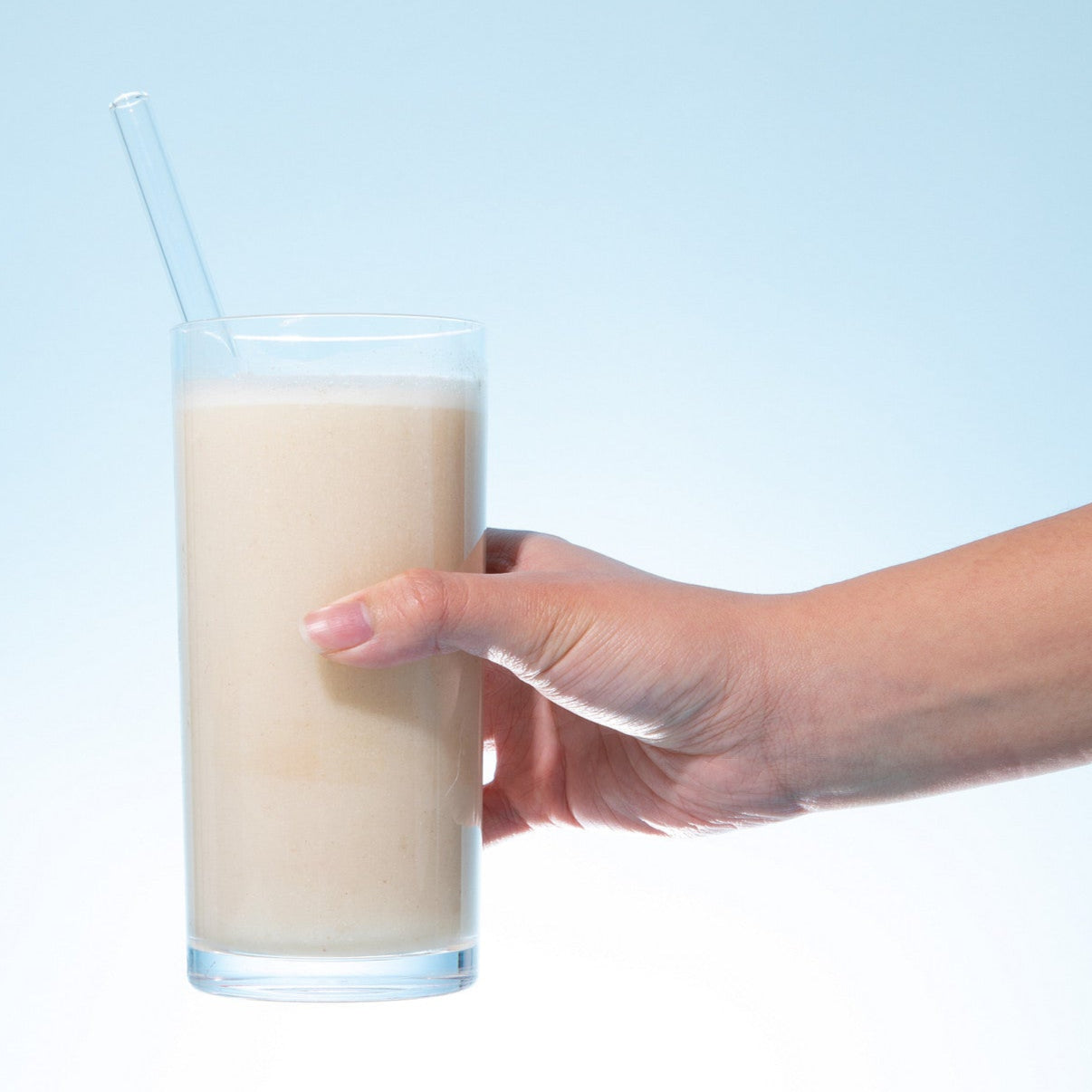 Vanilla Biocare 30G Protein Dietary Beverage with 14 servings, showing the ready-to-drink vanilla protein shake in a glass with a straw.