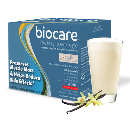 Glass of vanilla-flavored Biocare 30g protein dietary beverage with 14 servings in a box, showcasing the product packaging.