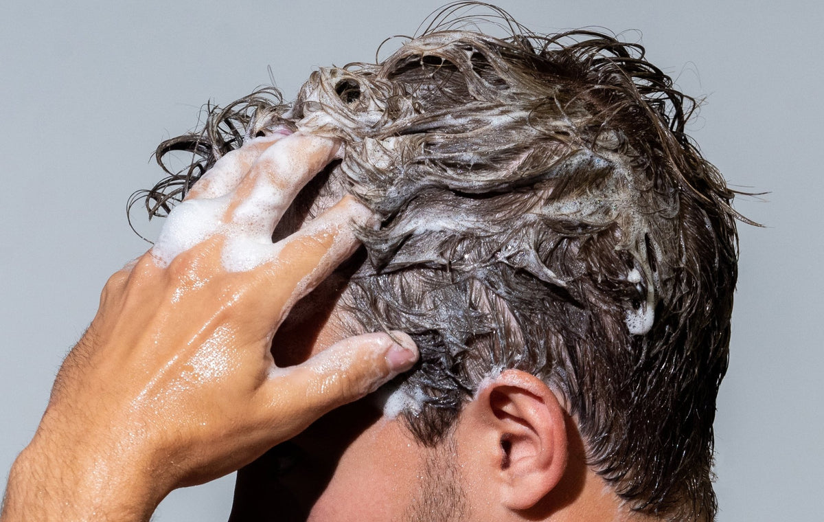 Blu Atlas Natural Shampoo for hair in an 8oz bottle, featuring a clear bottle with a white label and blue accents.