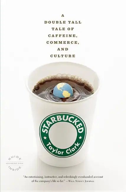 Starbucked paperback book by splitShops featuring a colorful cover with bold title and author details, placed on a wooden surface