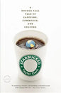 Starbucked paperback book by splitShops featuring a colorful cover with bold title and author details, placed on a wooden surface