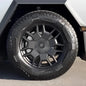 Four Tesla Cybertruck brake caliper covers in black with red accents, designed for enhanced appearance and protection.