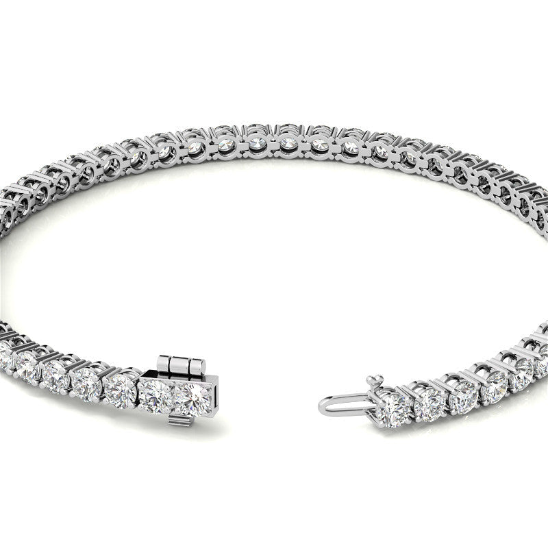 VOSSAGIN 6ctw created sapphire tennis bracelet with 3mm stones in 14K gold overlay, available in white, yellow, or rose gold.