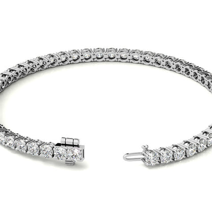 VOSSAGIN 6ctw created sapphire tennis bracelet with 3mm stones in 14K gold overlay, available in white, yellow, or rose gold.