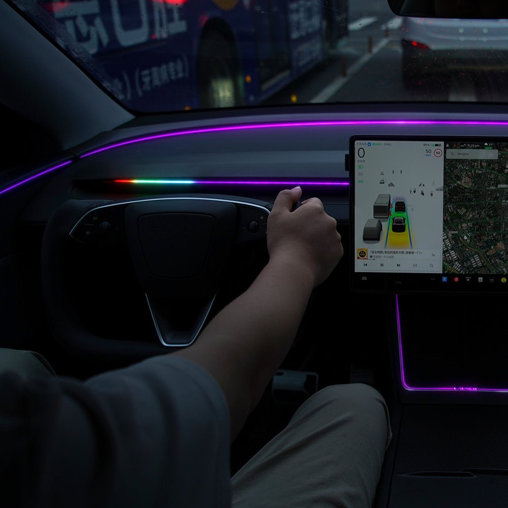TESERY NeuroLight RGB ambient dashboard lighting for Tesla Model 3/Y with integrated BSD system and OEM screen control.
