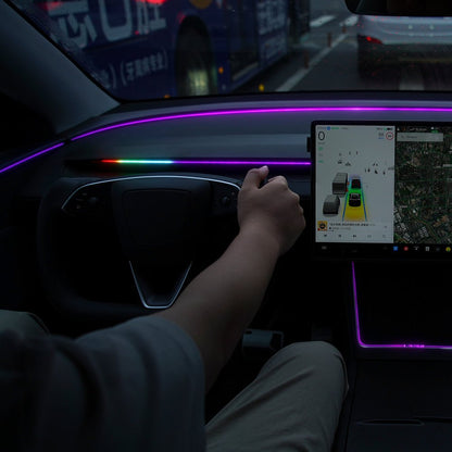 TESERY NeuroLight RGB ambient dashboard lighting for Tesla Model 3/Y with integrated BSD system and OEM screen control.