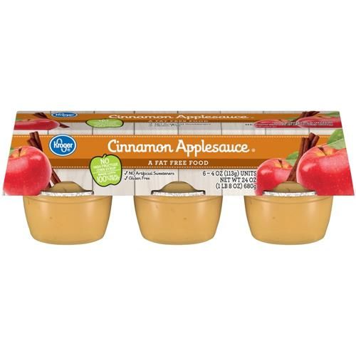 Kroger Cinnamon Applesauce Cups byBies, 6-pack of 4 oz candy and chocolate snack cups with cinnamon applesauce.