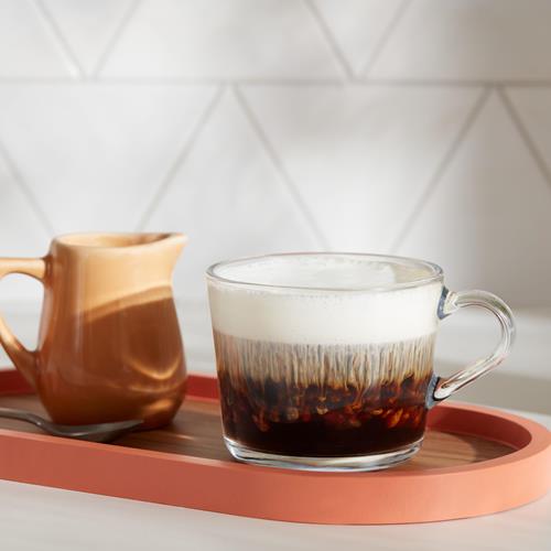 ByBies Dunkin French Vanilla flavored ground coffee in a 12-ounce pack, showcasing the coffee grounds and packaging.