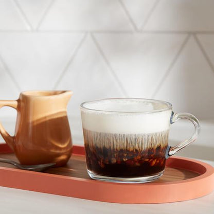 ByBies Dunkin French Vanilla flavored ground coffee in a 12-ounce pack, showcasing the coffee grounds and packaging.