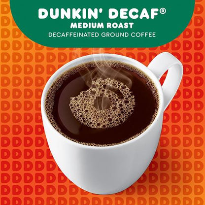 ByBies Dunkin Original Blend medium roast decaf ground coffee in a 12-ounce bag, showing the packaging with coffee grounds and branding.