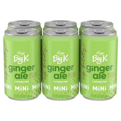 Six caffeine-free Big K Ginger Ale mini soda cans, 7.5 fl oz each, by ByBies, with colorful packaging and branding.