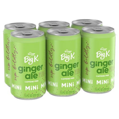 Six caffeine-free Big K Ginger Ale mini soda cans from ByBies, each 7.5 fl oz, with colorful labels and metallic cans.