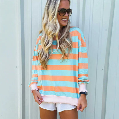 Relaxed-fit striped colorblock crewneck sweatshirt in a minimalist pullover design