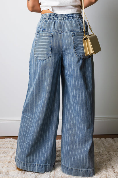 Light blue Sutton casual wide leg jeans by Threaded Pear displayed on a model, featuring a relaxed fit and classic denim style.
