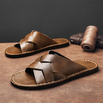 Western-style flat-bottom hollowed-out large-size slippers in tan faux leather with decorative stitching