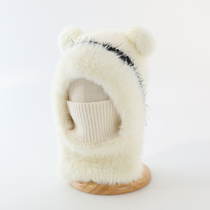 Warm windproof knitted wool hat with earflaps in a cozy textured design